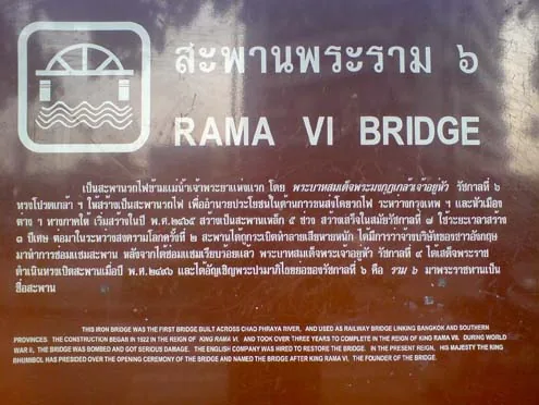 Historical information plaque describing the Rama VI Bridge over the Chao Phraya River