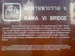 Historical information plaque describing the Rama VI Bridge over the Chao Phraya River